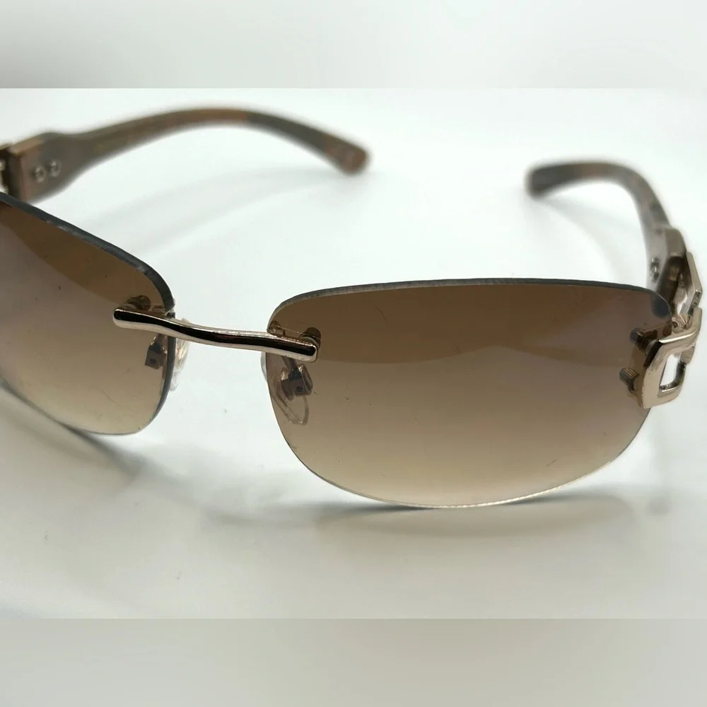 Vintage 90s Y2K Foster Grant Rimless gold link accent Sunglasses